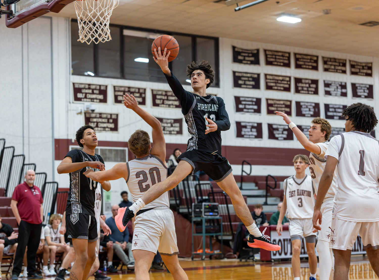 Westhampton Beach senior Dante Quinones goes up for two points.   RON ESPOSITO