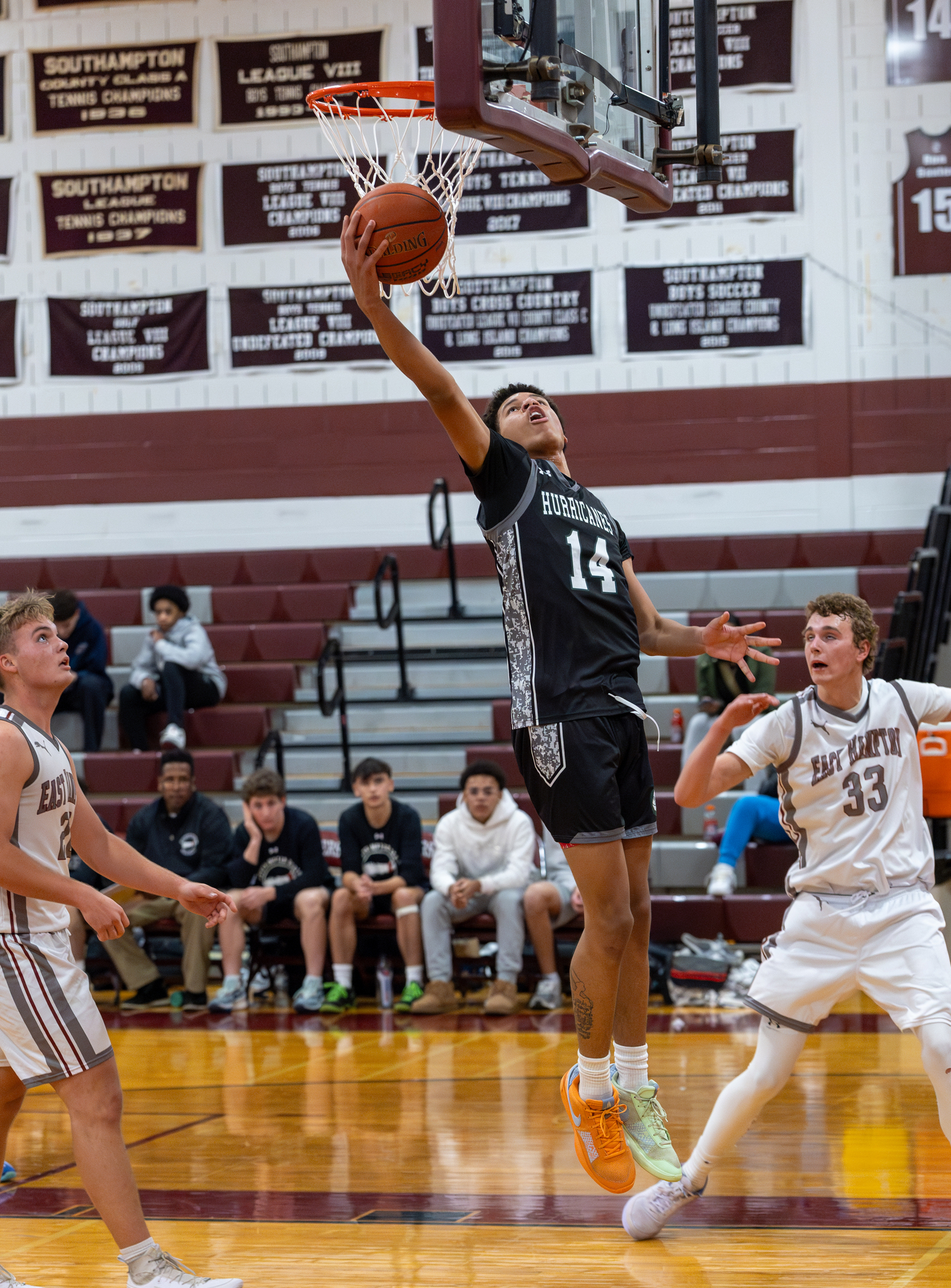 Westhampton Beach senior Jorden Bennett goes up and under for a basket. Bennett was named to the All-Tournament Team of the two-day Mariner Athletic Club Holiday Classic.   RON ESPOSITO