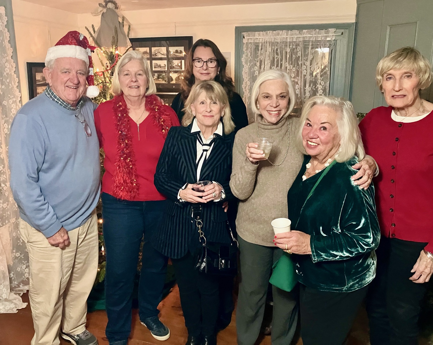 The Greater Westhampton Historical Museum held its annual holiday gathering recently and among those attending were, from left, Bob Murray, Liz Plate’, Ruth Ann Rosenfeld, Peggy Veziris, Yvonne Hadlock, Alicia Whitaker, Nancy Lombardi, all of whom are members of the Westhampton Garden Club. COURTESY GREATER WESTHAMPTON HISTORICAL MUSEUM