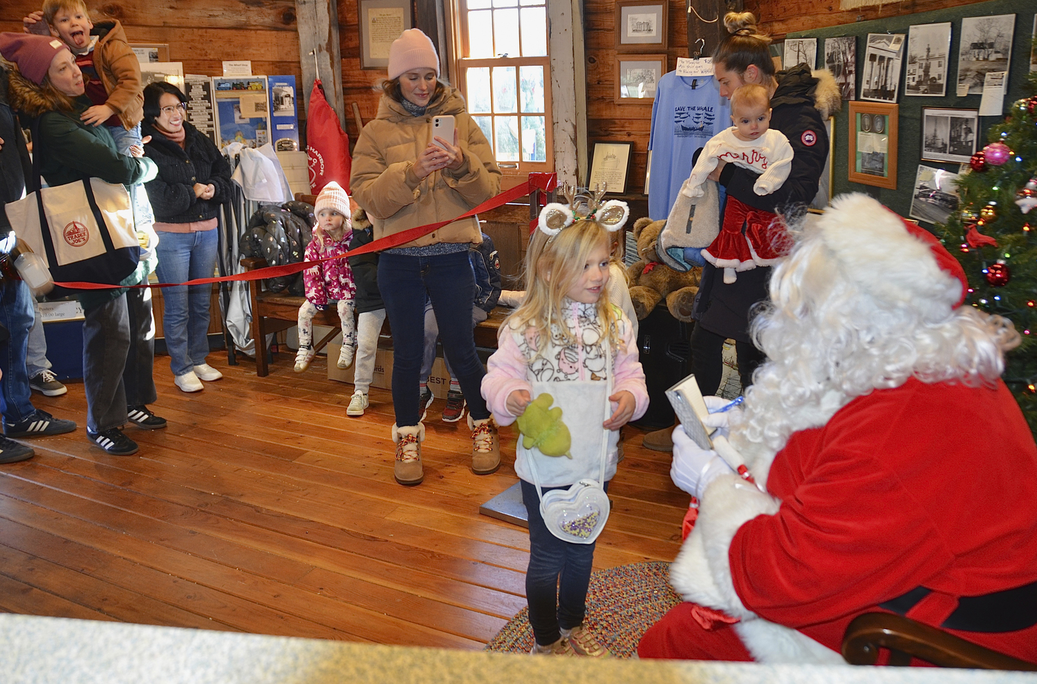 Santa paid a visit to the windmill in Sag Harbor on Saturday.  KYRIL BROMLEY