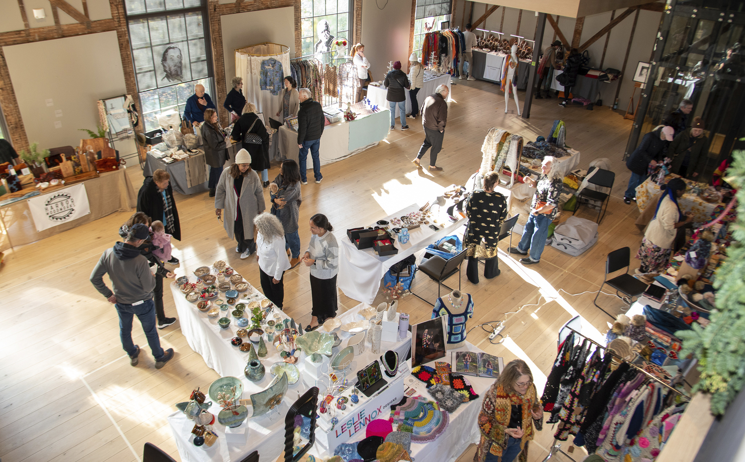 Shopper browse at the Maker's Market held at The Church in Sag Harbor on Saturday.  LISA TAMBURINI