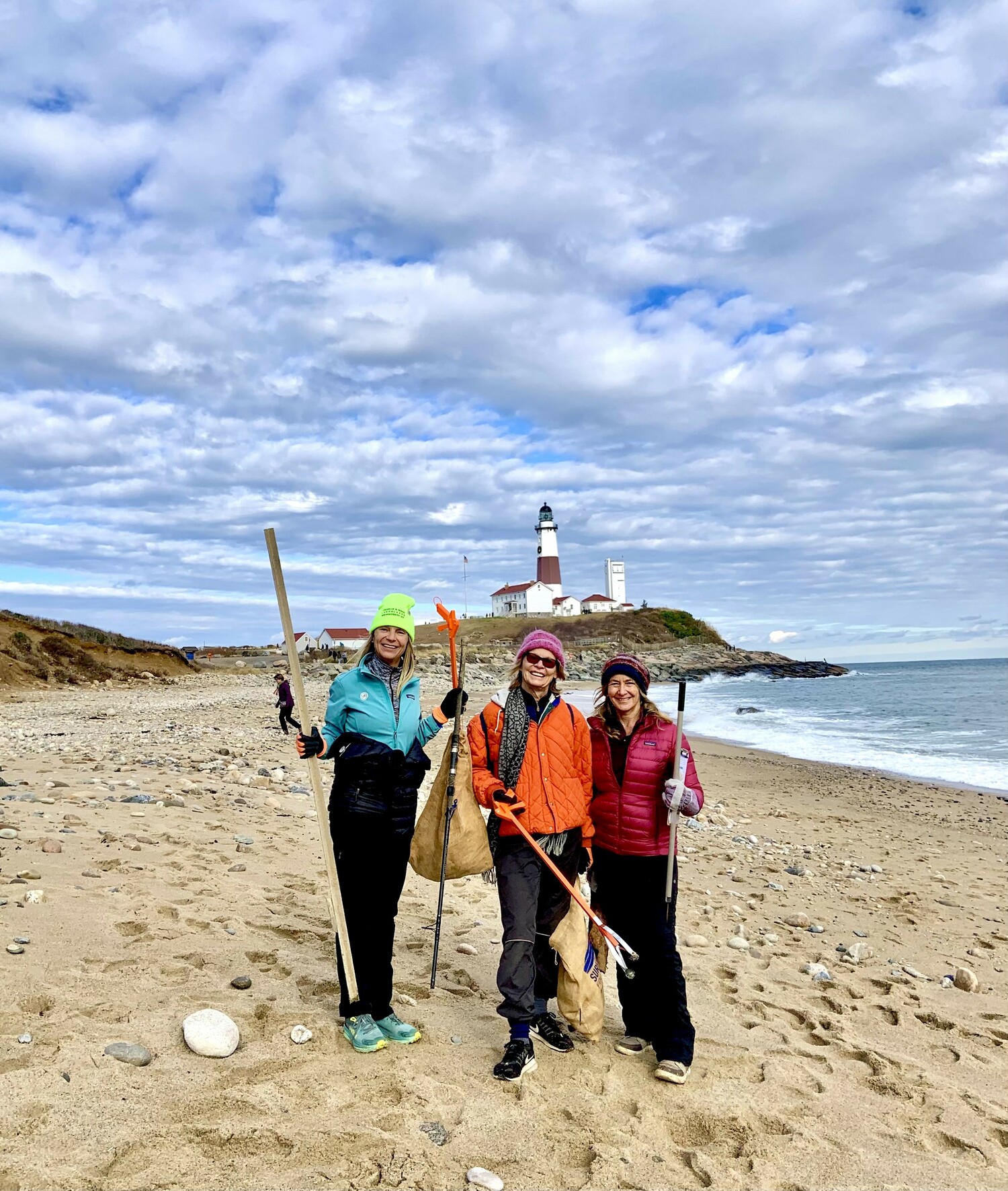 Daintrie Zega, Dianne Ryan, and Evelyn O’Doherty were among those who volunteered to help the Eastern Long Island Chapter of Surfrider with a 