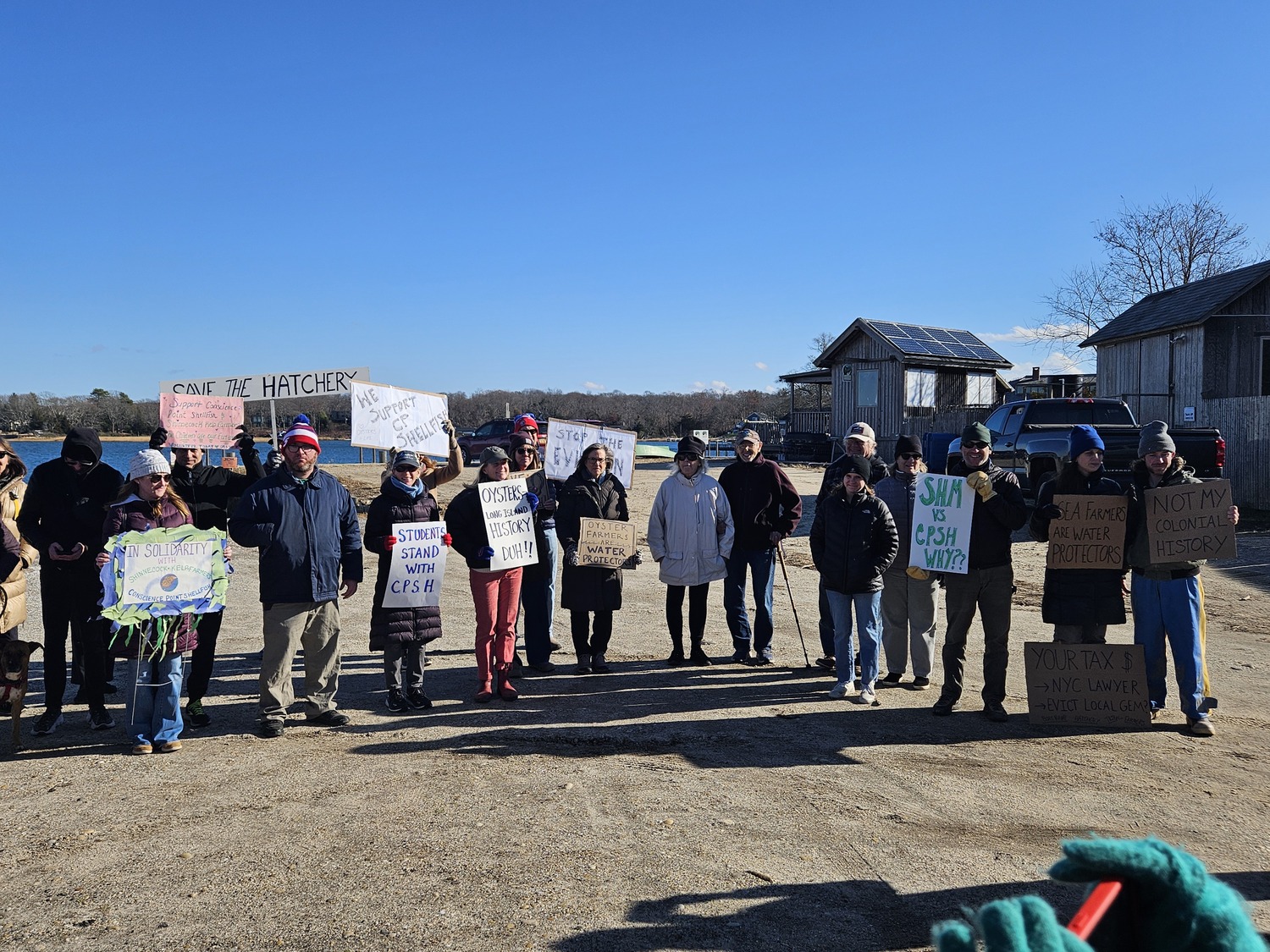 Members of the Shinnecock Nation and supporters of the Conscience Point Shellfish Hatchery staged a protest on Saturday at the historic landing site of the first English settlers of the South Fork over the Southampton History Museum, which owns the land, revoking the lease to the hatchery. TESS MAHONEY