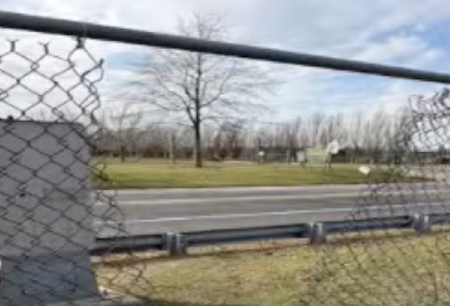 A hole in the fencing along Long Lane outside East Hampton High School. EAST HAMPTON SCHOOL DISTRICT