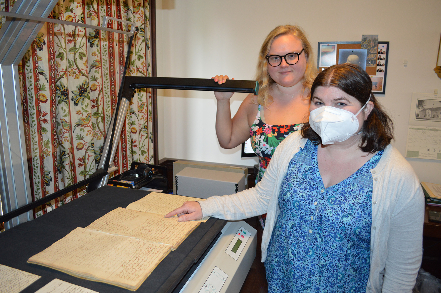 Julia Tyson, Long Island Collection librarian/archivist, and Andrea Meyer, librarian/archivist and head of the Long Island Collection. KERI LAMPARTER