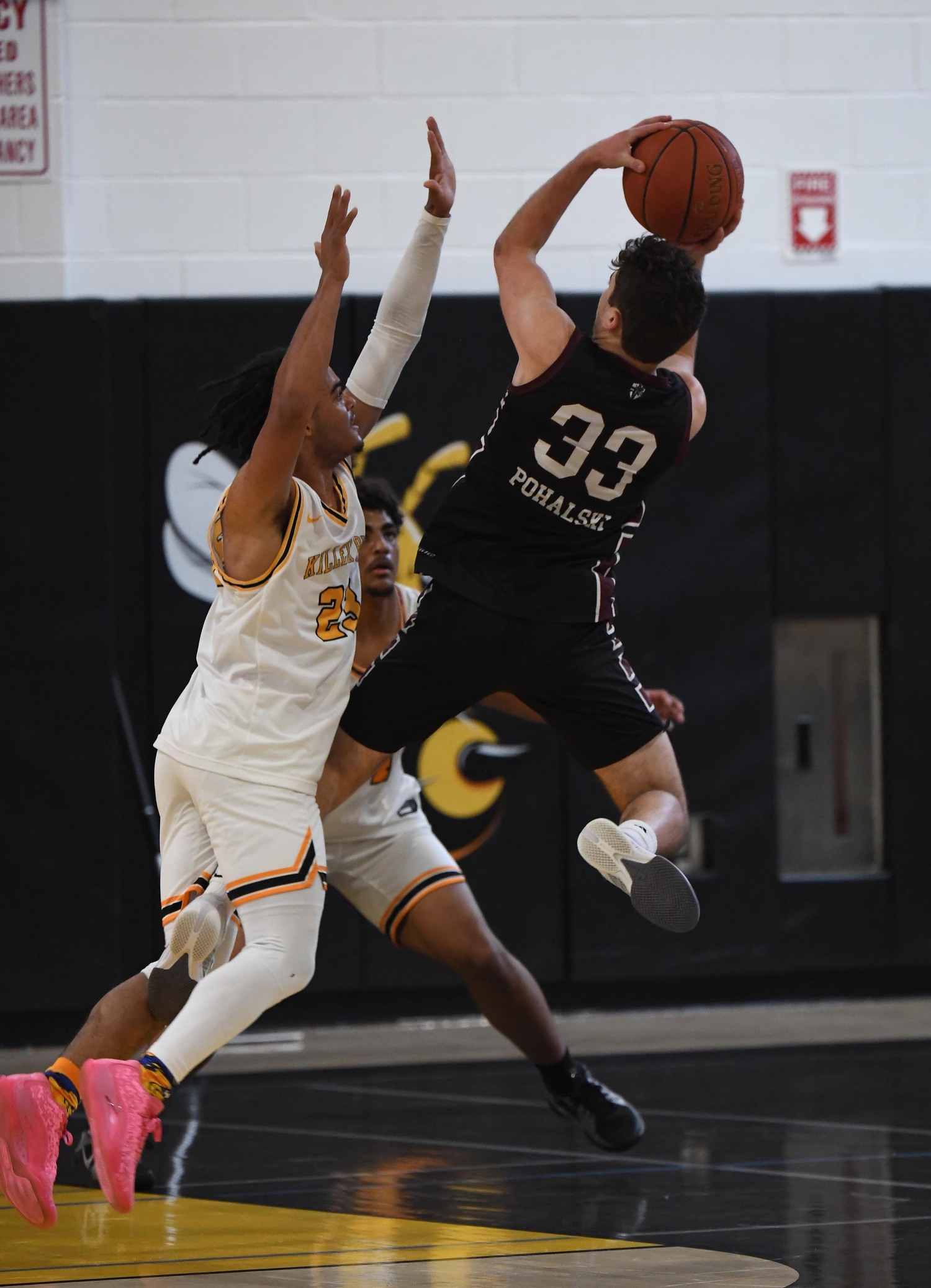 Bridgehampton senior Jaylen Harding pressures Pohalsky of St. Pius.   DOUG KUNTZ