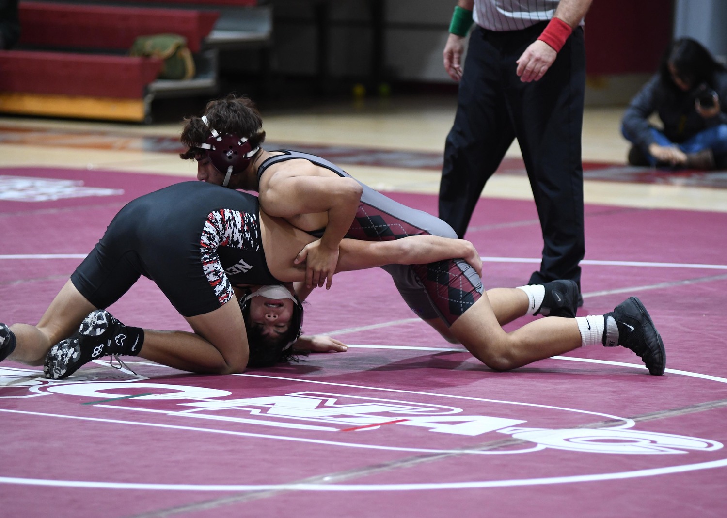 Andy Berrezueta sprawls to block a shot from a Newfield opponent.  DOUG KUNTZ