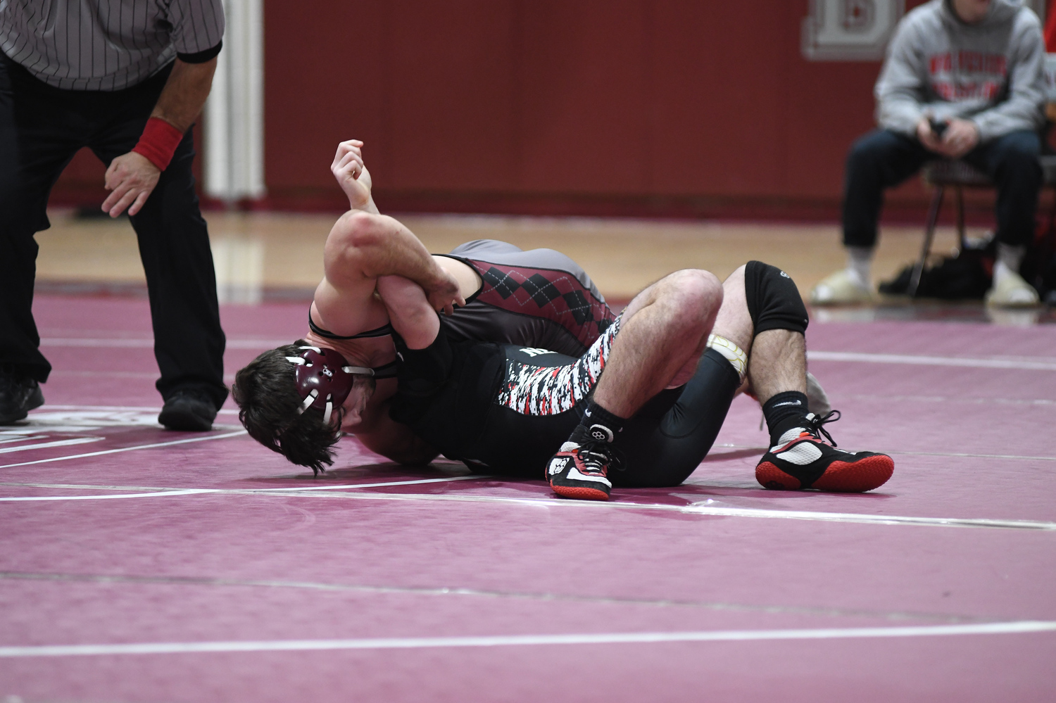 Justin Prince pinned his Newfield opponent on Friday night.  DOUG KUNTZ