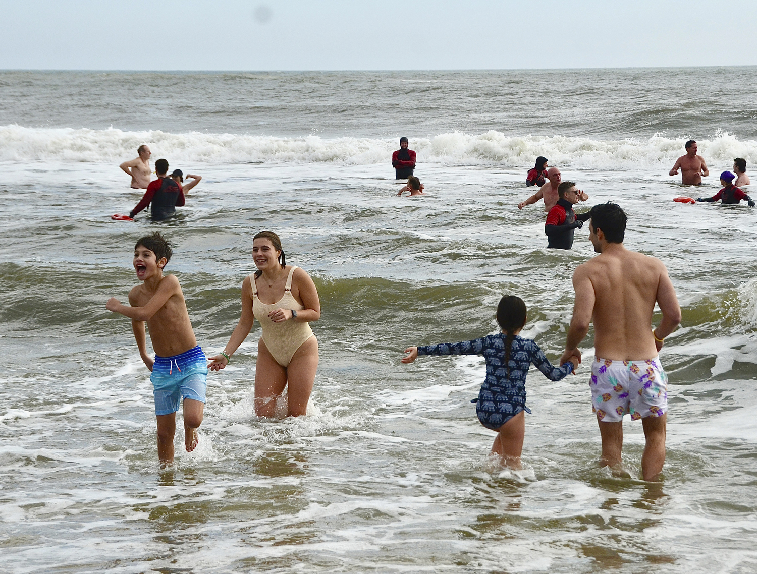 Brave souls taking the plunge on New Year's Day.  KYRIL BROMLEY