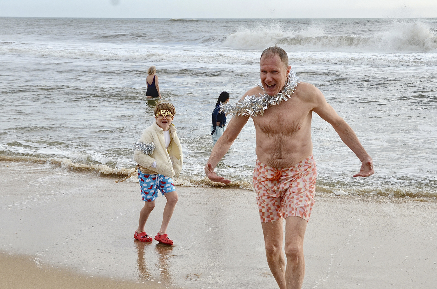 Brave souls taking the plunge on New Year's Day.  KYRIL BROMLEY