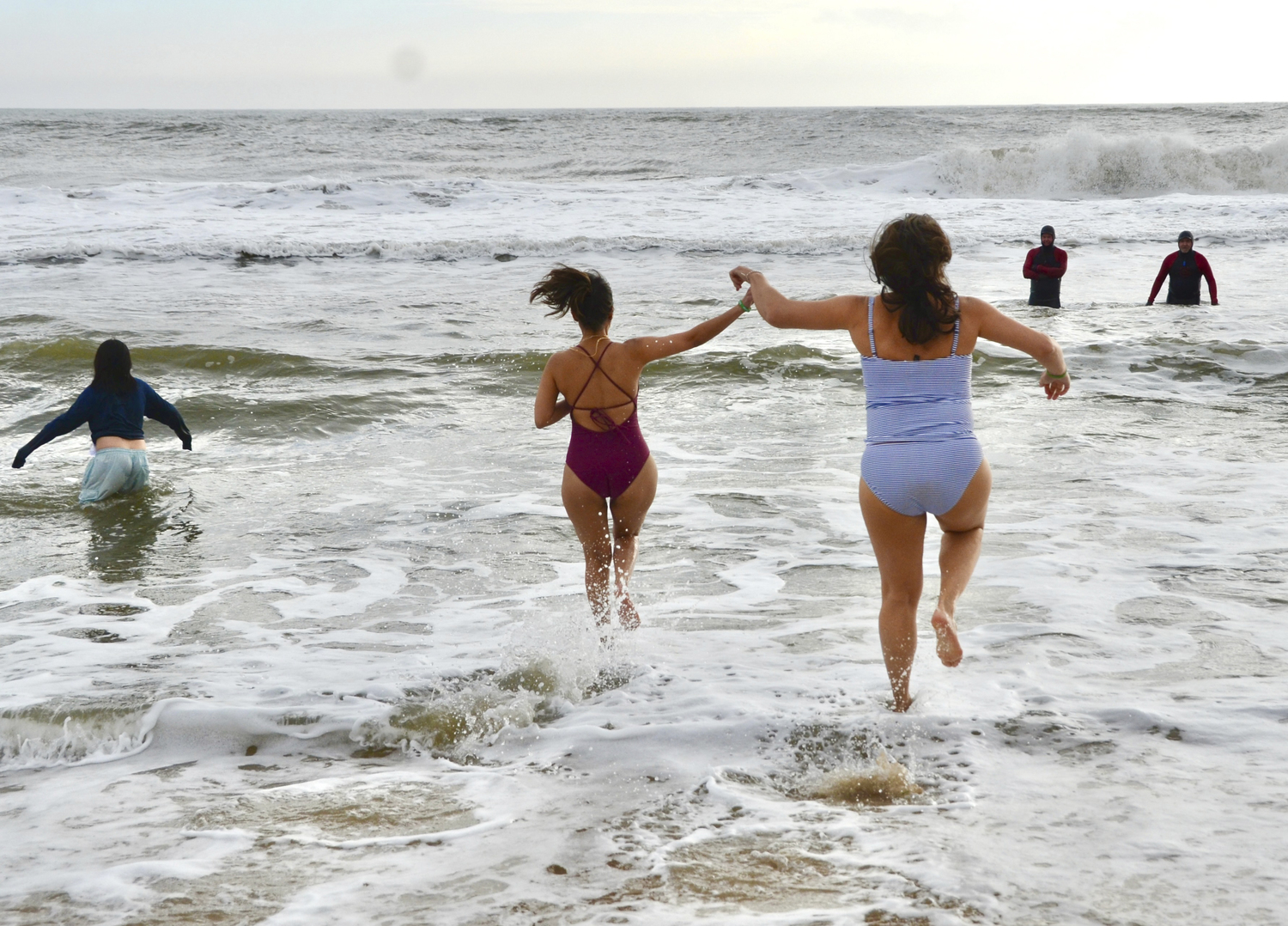 Brave souls taking the plunge on New Year's Day.  KYRIL BROMLEY