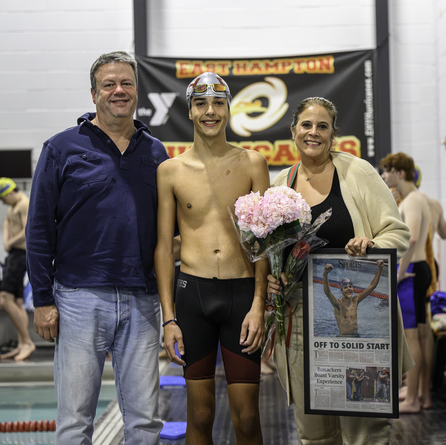 Pierson senior Jack Ziemer, with his parents, was recognized before his final home meet January 16. MARIANNE BARNETT