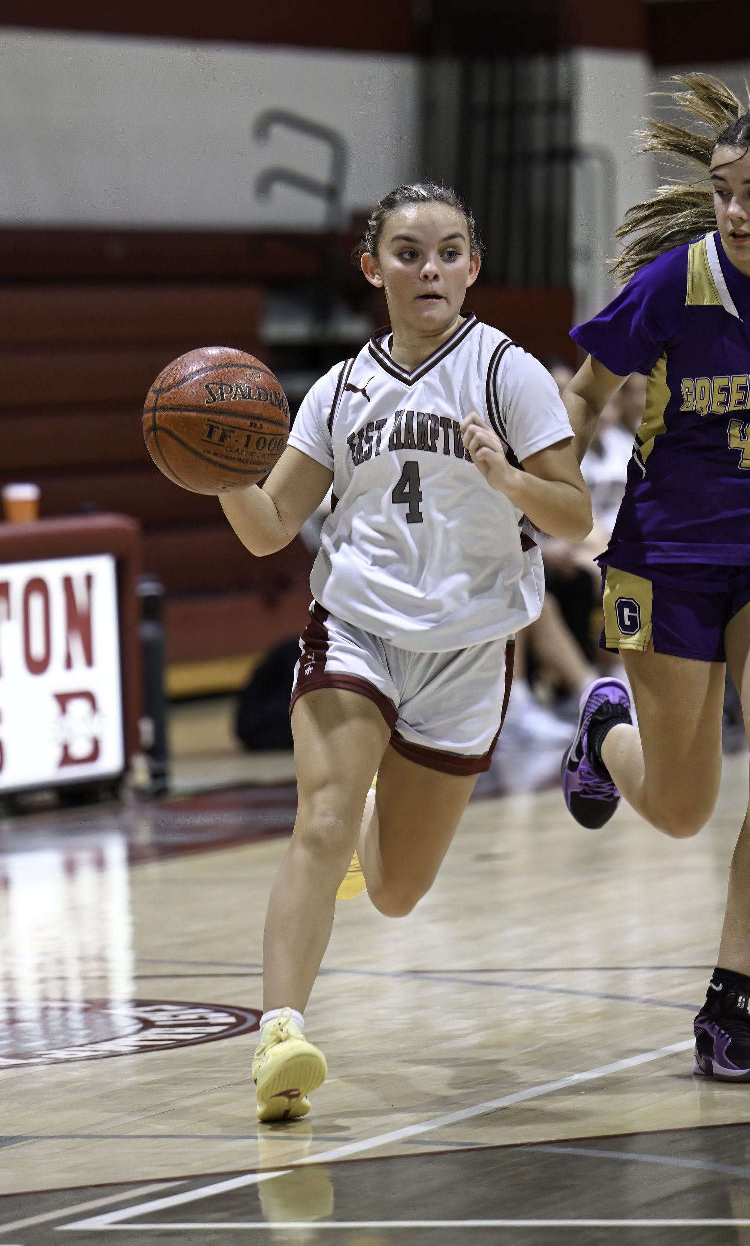 East Hampton junior Brynley Lys drives to the basket.   MARIANNE BARNETT