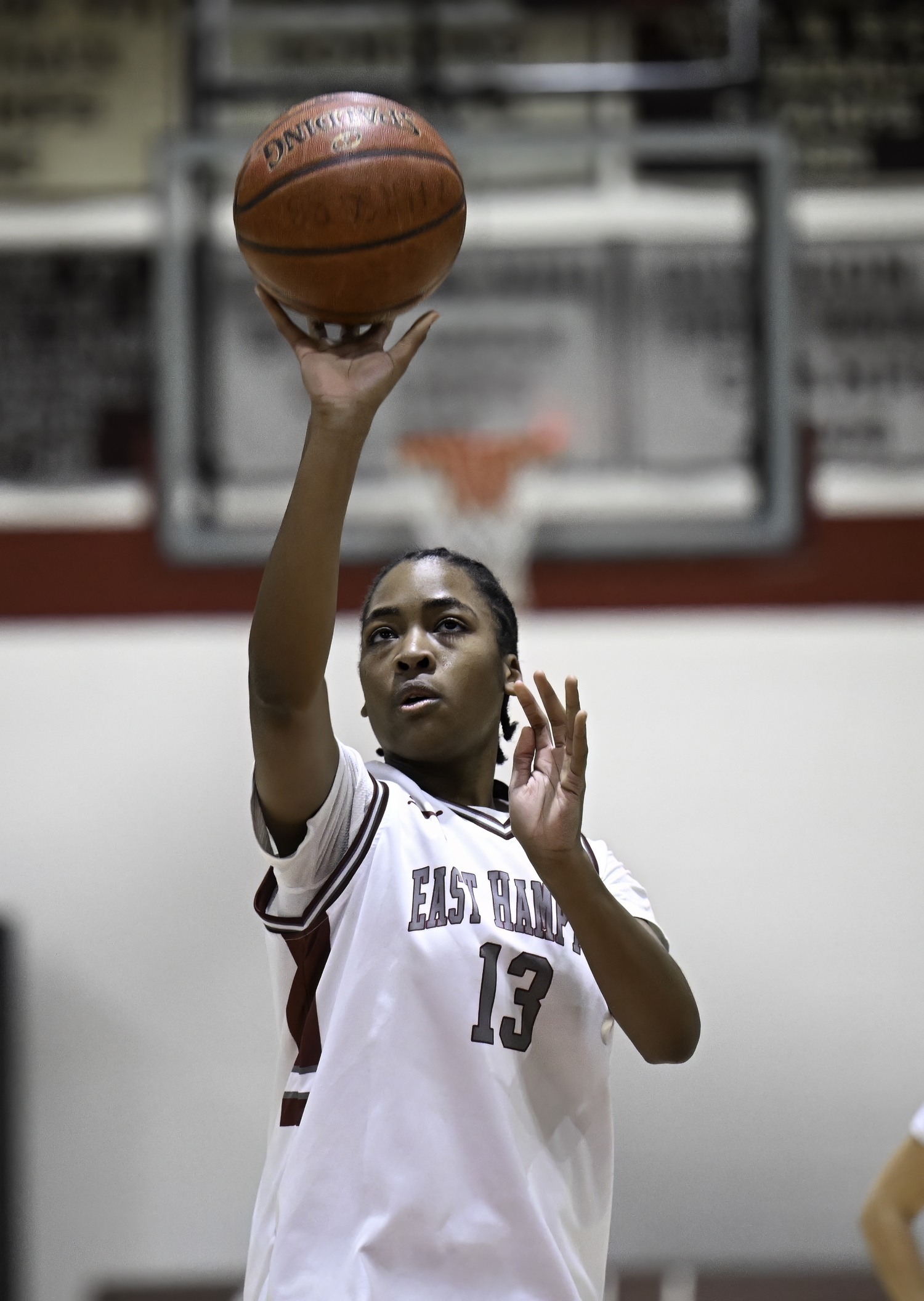 East Hampton's K.K. Moore shoots.   MARIANNE BARNETT