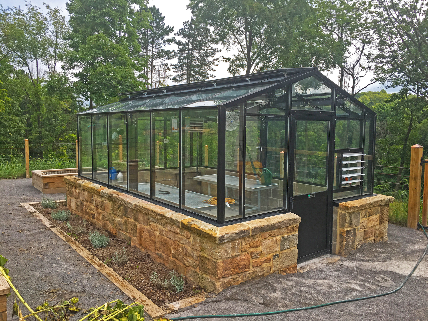 This greenhouse would be perfect for your little Hamptons estate garden -- if you can afford it. This modest setup would run you well over $60,000 and up, start to finish. Oh, but what fun.  COURTESY JANCO GREENHOUSES