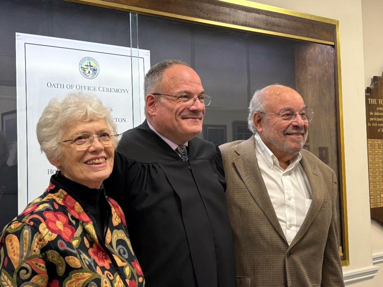 Adam Grossman was recently sworn in as a Southampton Town Justice by Judge Kooperstein. His parents Janet and Karl Grossman,  were there for the occasion. COURTESY KARL GROSSMAN