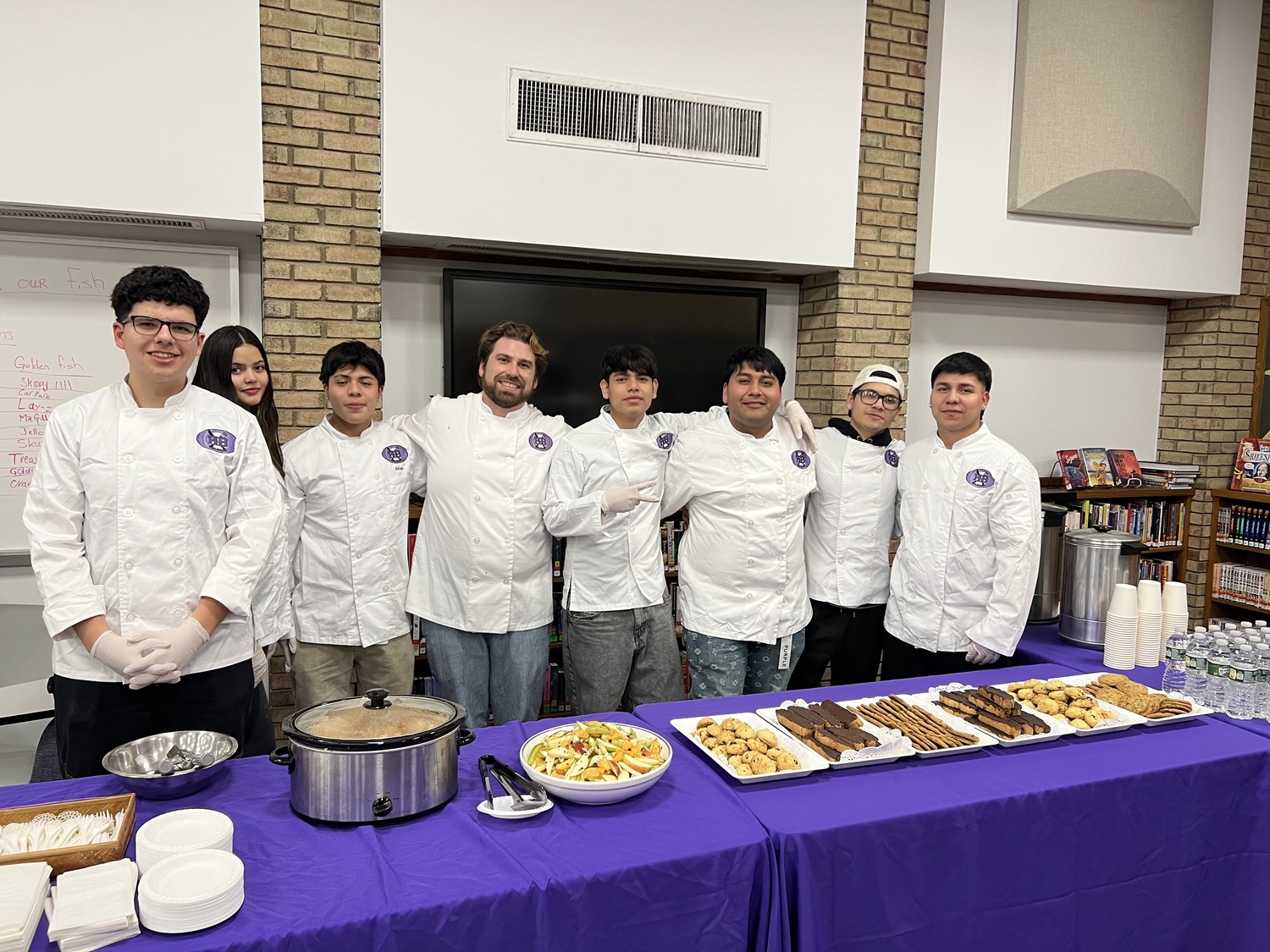 Hampton Bays High School culinary arts students with chef Conor Curtis are providing catering for the Hampton Bays School District’s new Bilingual Parent Partnership initiative. COURTESY HAMPTON BAYS SCHOOL DISTRICT