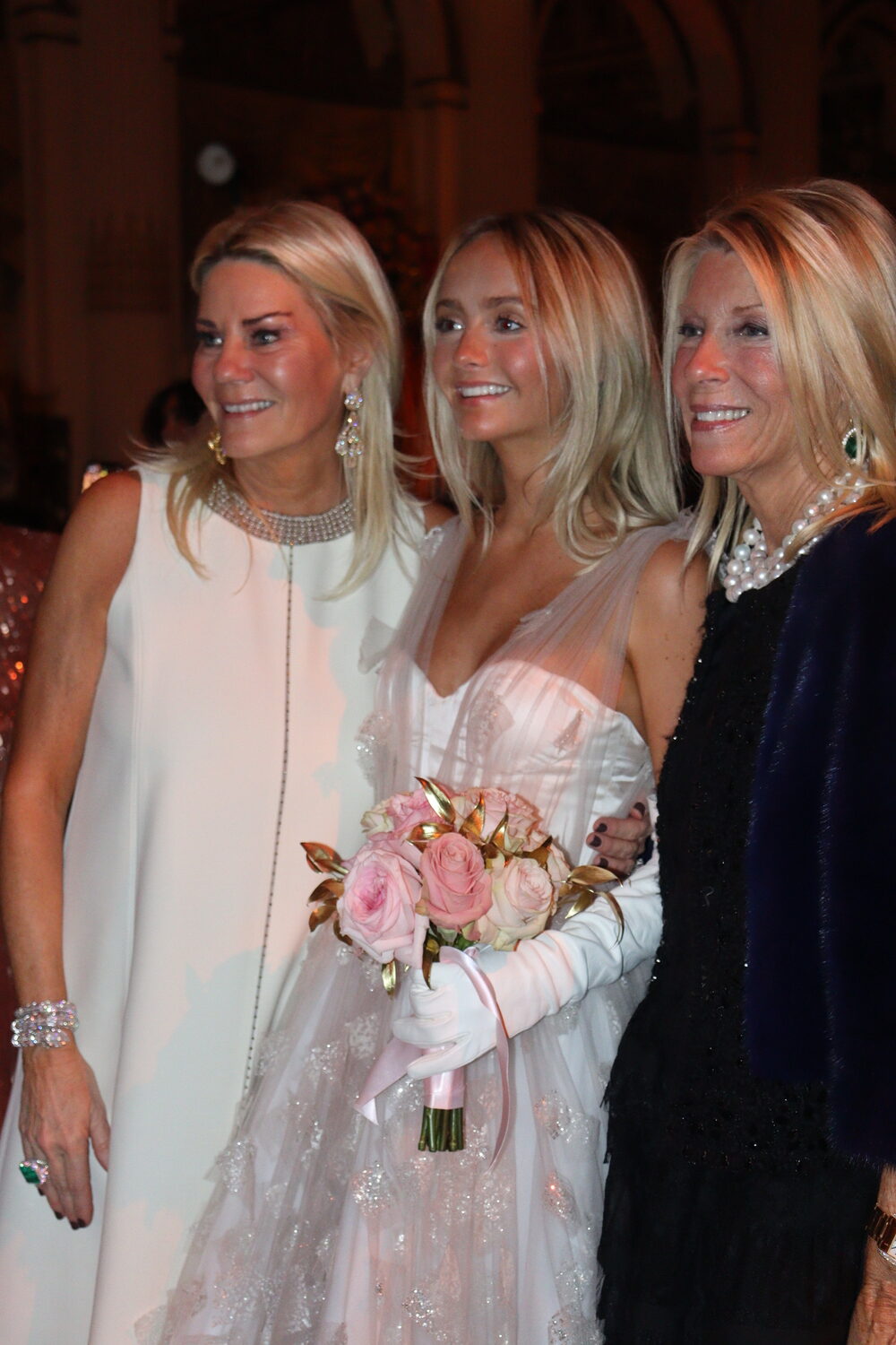 Debutante Kelli Chambers Ford, center, with her mother, Kelli Ford (left). CAILIN RILEY