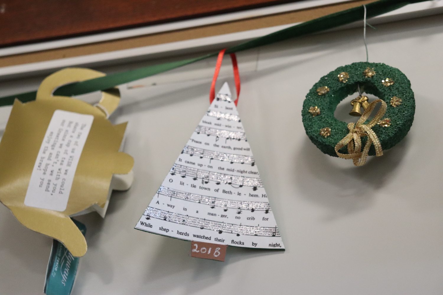 Samples of many of the homemade Christmas ornaments that Marjorie Ridgway has made over the years were on display at her 100th birthday celebration at the Windmill Lane Firehouse in Southampton on January 4. CAILIN RILEY