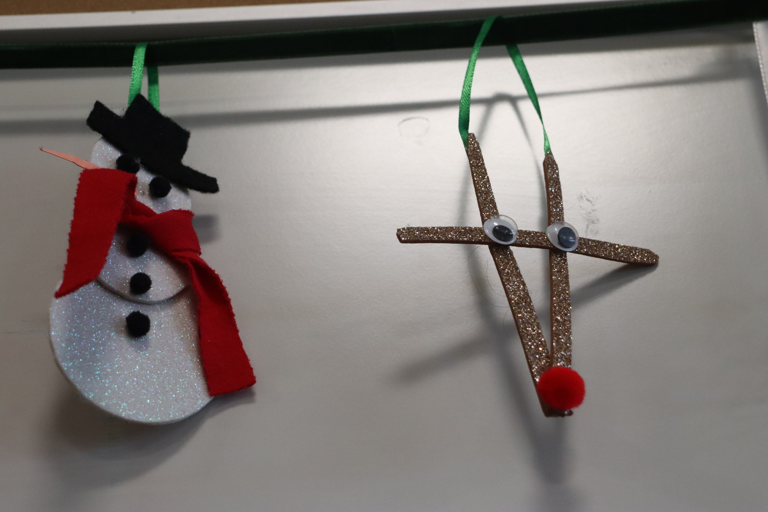 Samples of many of the homemade Christmas ornaments that Marjorie Ridgway has made over the years were on display at her 100th birthday celebration at the Windmill Lane Firehouse in Southampton on January 4. CAILIN RILEY