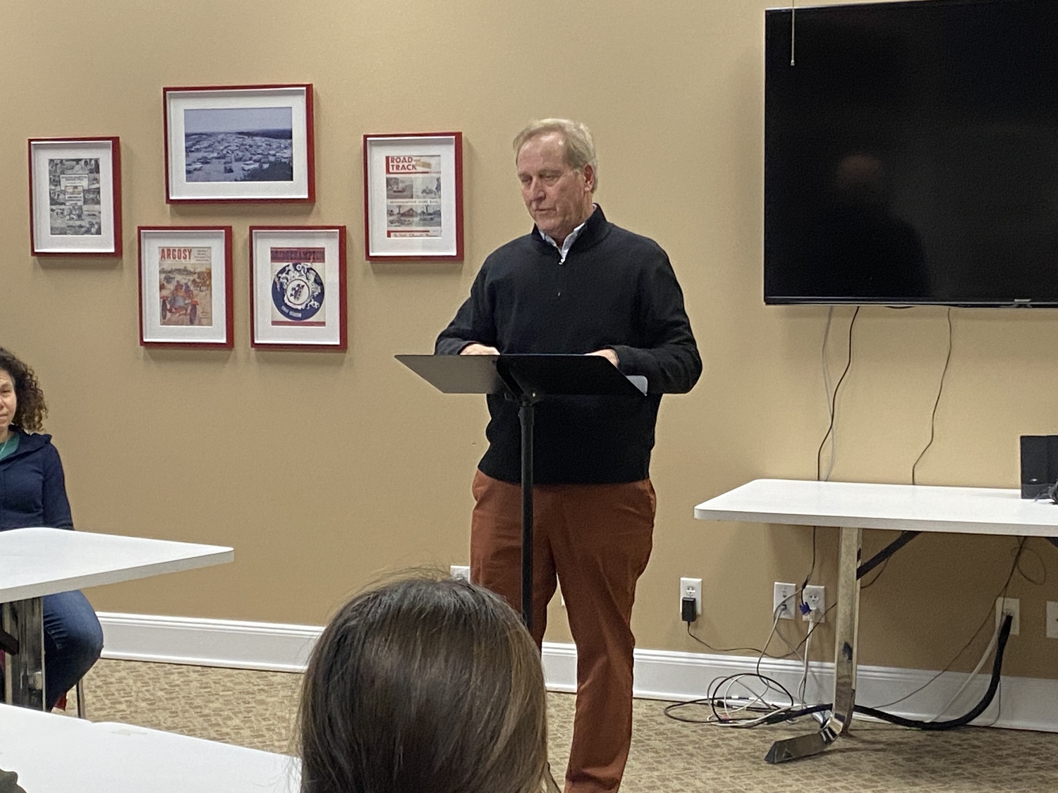 Barry Raebeck of the East Hampton Level Playing Field Foundation spoke with the Foundation's scholarship recipients on Monday. CHRISTOPHER WALSH