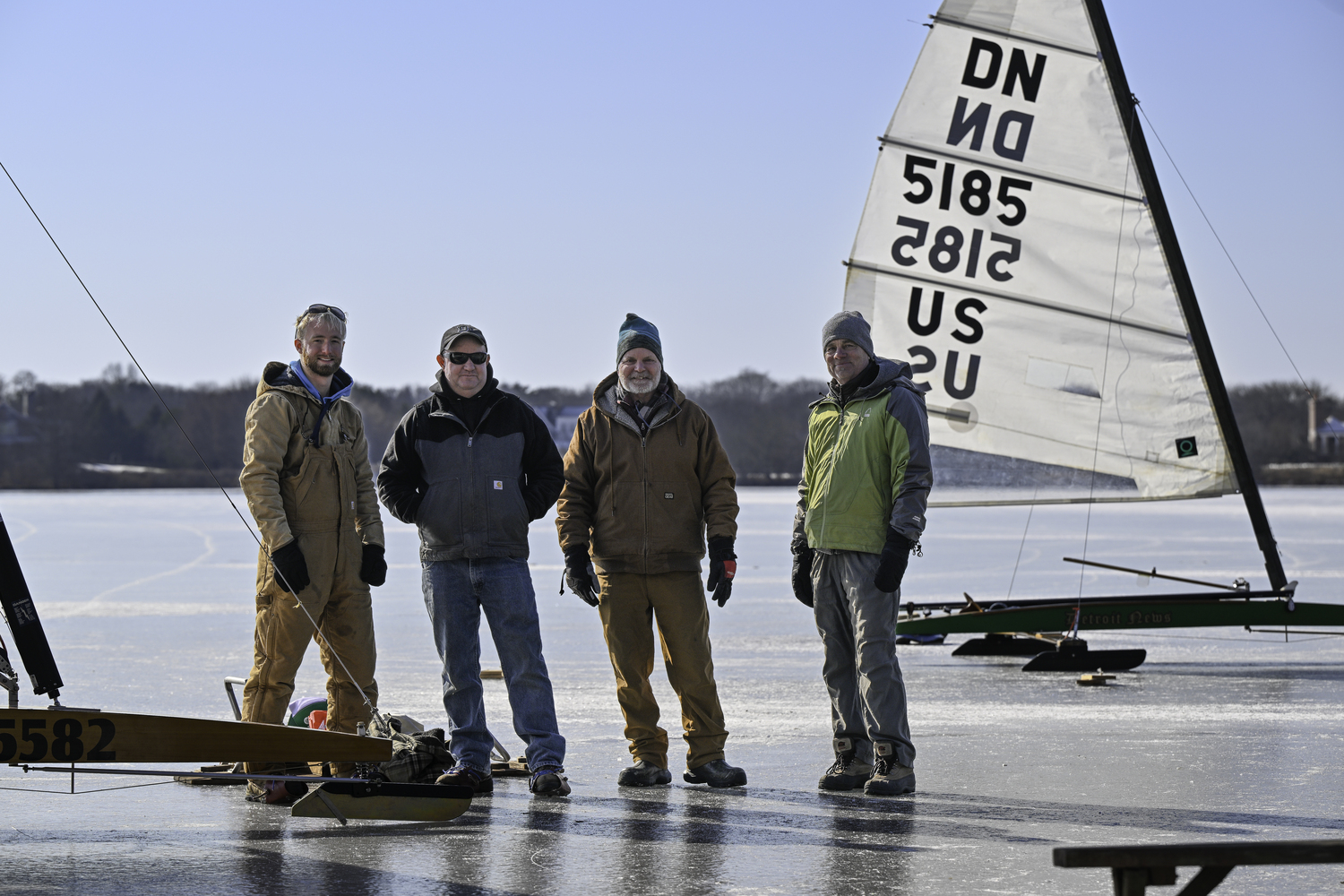 Eli Halsey, left, Adam Halsey, Mosey Muller and Ricky Muller all enjoying the ice at Mill Pond on Friday.    MARIANNE BARNETT