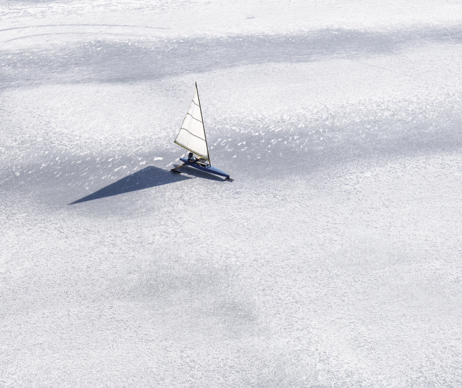 A lone boat out on the ice at Mill Pond, Water Mill.  MARIANNE BARNETT