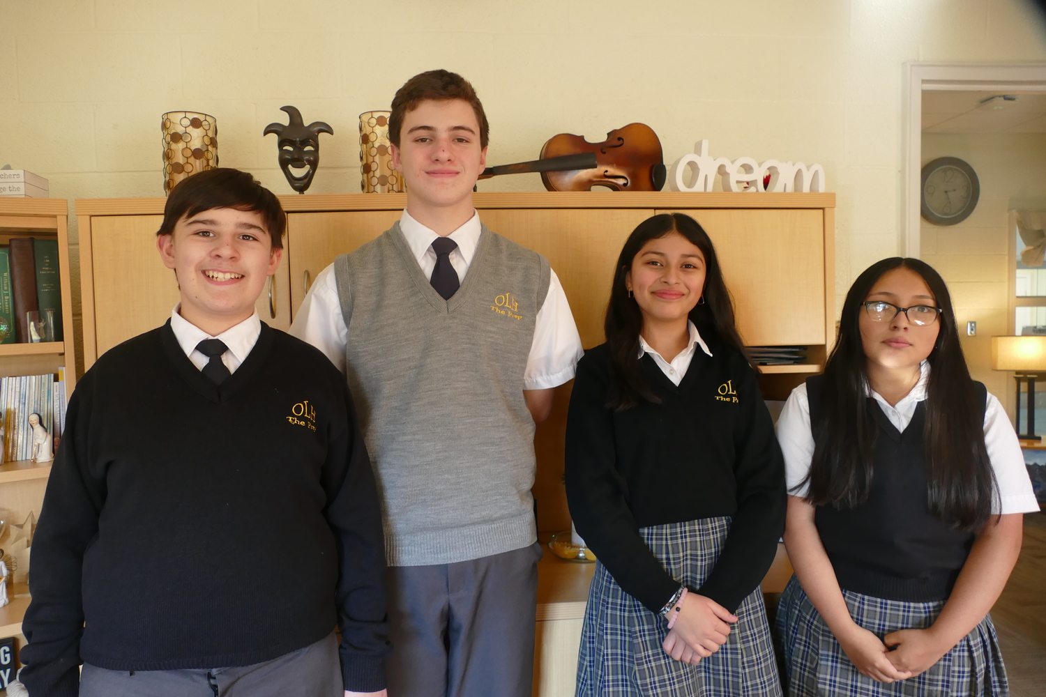 Our Lady of the Hamptons School student scholarship recipients are, from left, Vincent Bellucci, Gavin McGreevy, Mikayla Torres and Shayla Guerrero. Sofia Brady, not pictured, also received a scholarship. COURTESY OUR LADY OF THE HAMPTONS SCHOOL