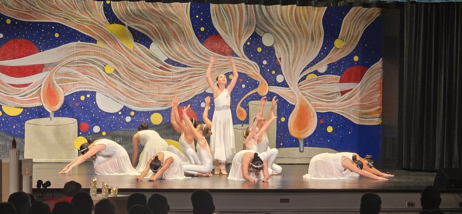 The Our Lady of the Hamptons modern dance troupe perform the 