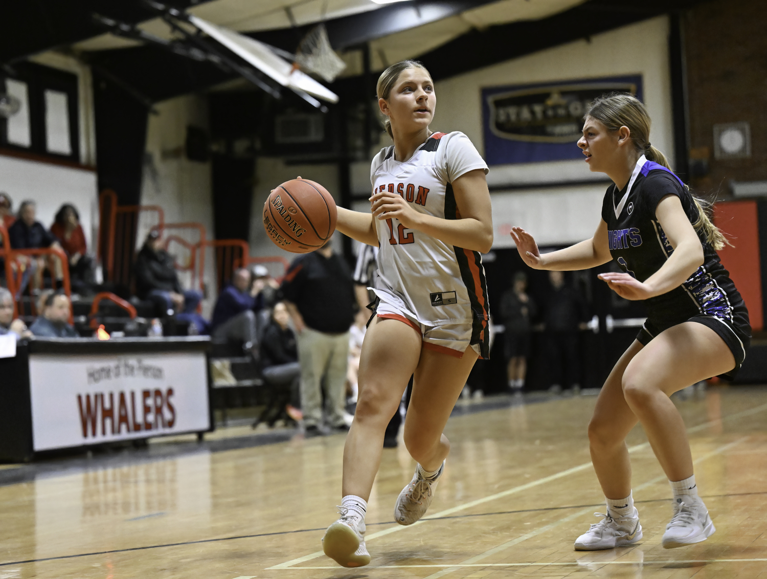 Lola Eldridge brings the ball into Pierson's offensive zone.  MARIANNE BARNETT