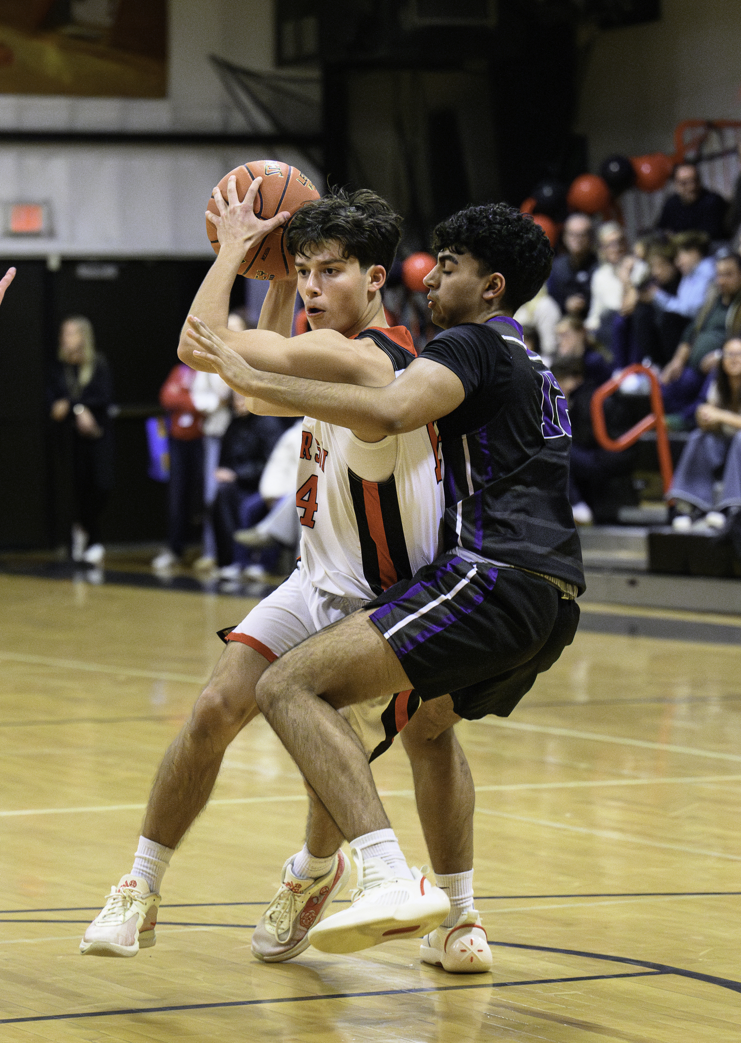 Pierson's Casey Finneli protects the ball from a Port Jefferson defender.  MARIANNE BARNETT