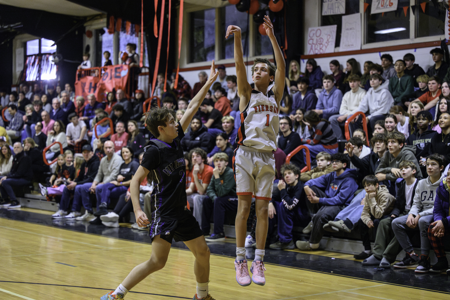 Joel Mather shoots in front of a jam-packed crowd on Spirit Night.   MARIANNE BARNETT