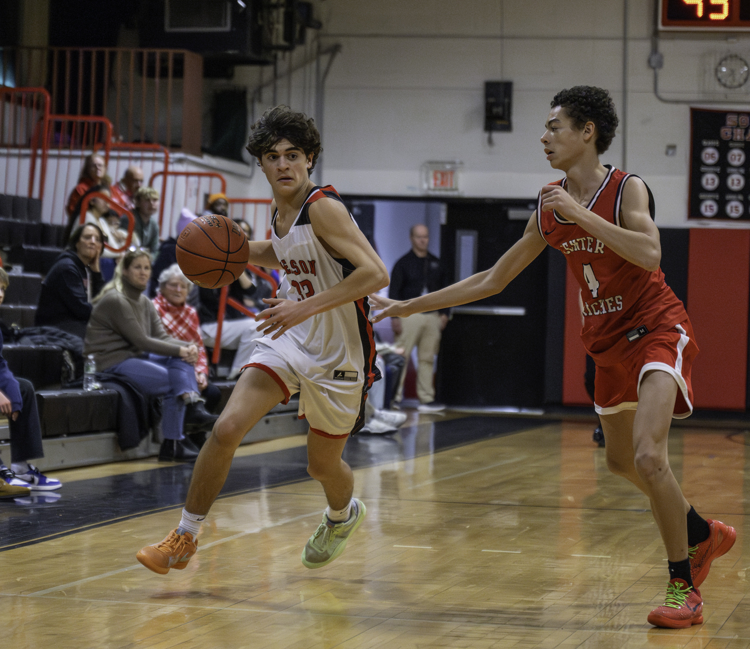 Whaler Max Vogel brings the ball down the court.  MARIANNE BARNETT