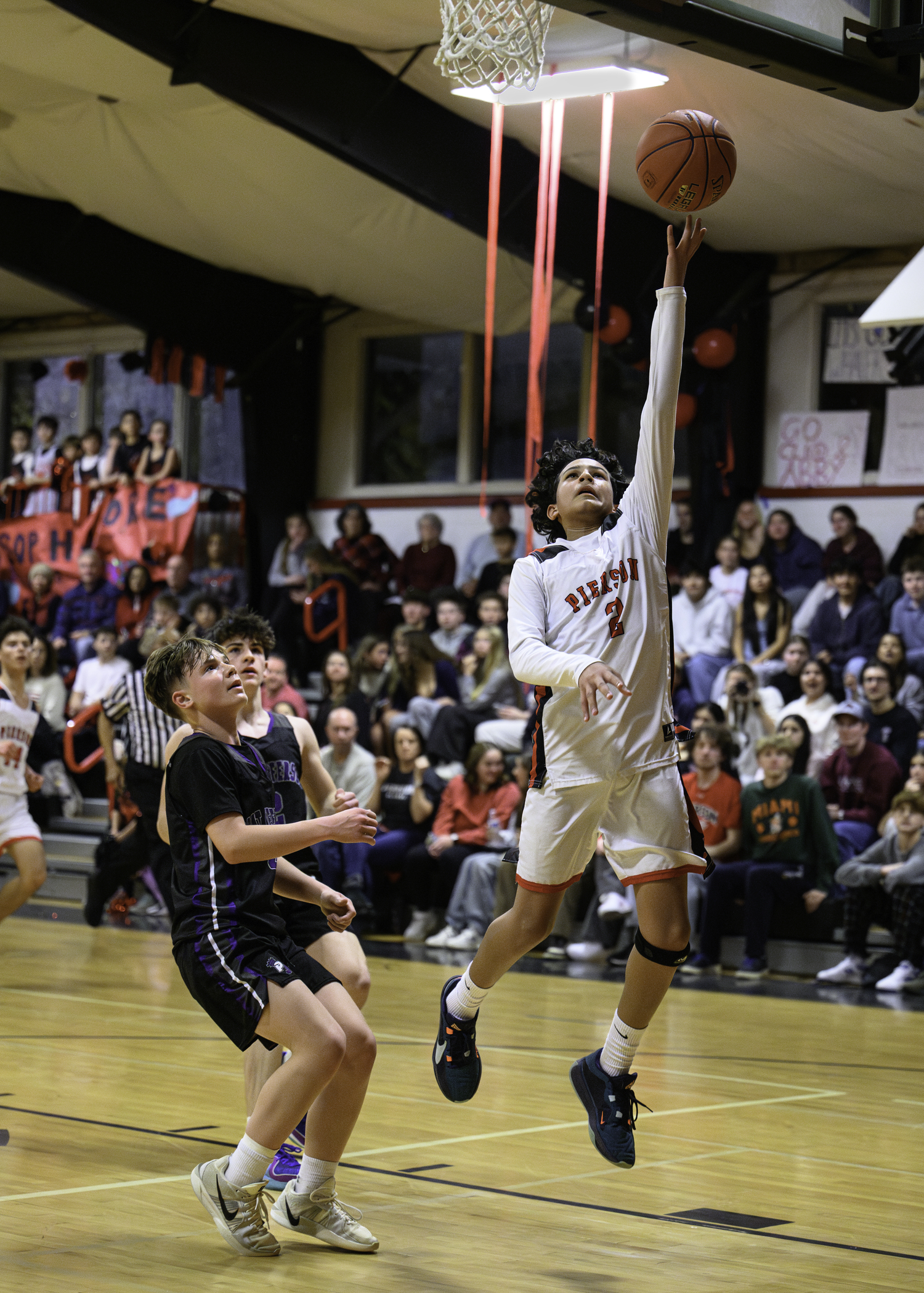 Pierson's Orion Aubry goes up with his left hand for a layup.   MARIANNE BARNETT