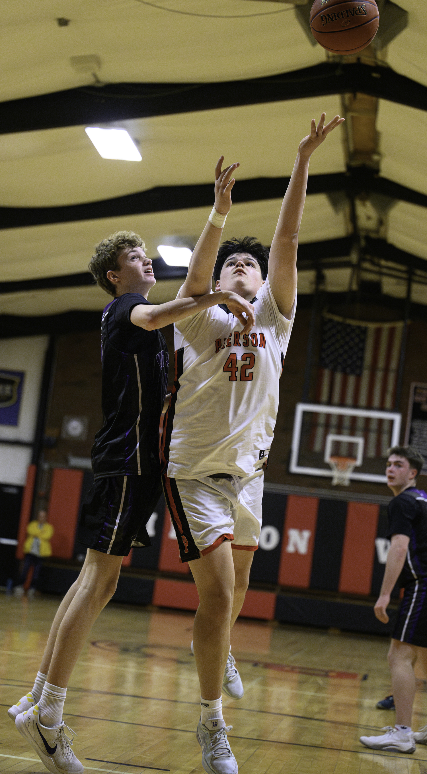 Pierson senior Paul Roesel puts up two points.   MARIANNE BARNETT