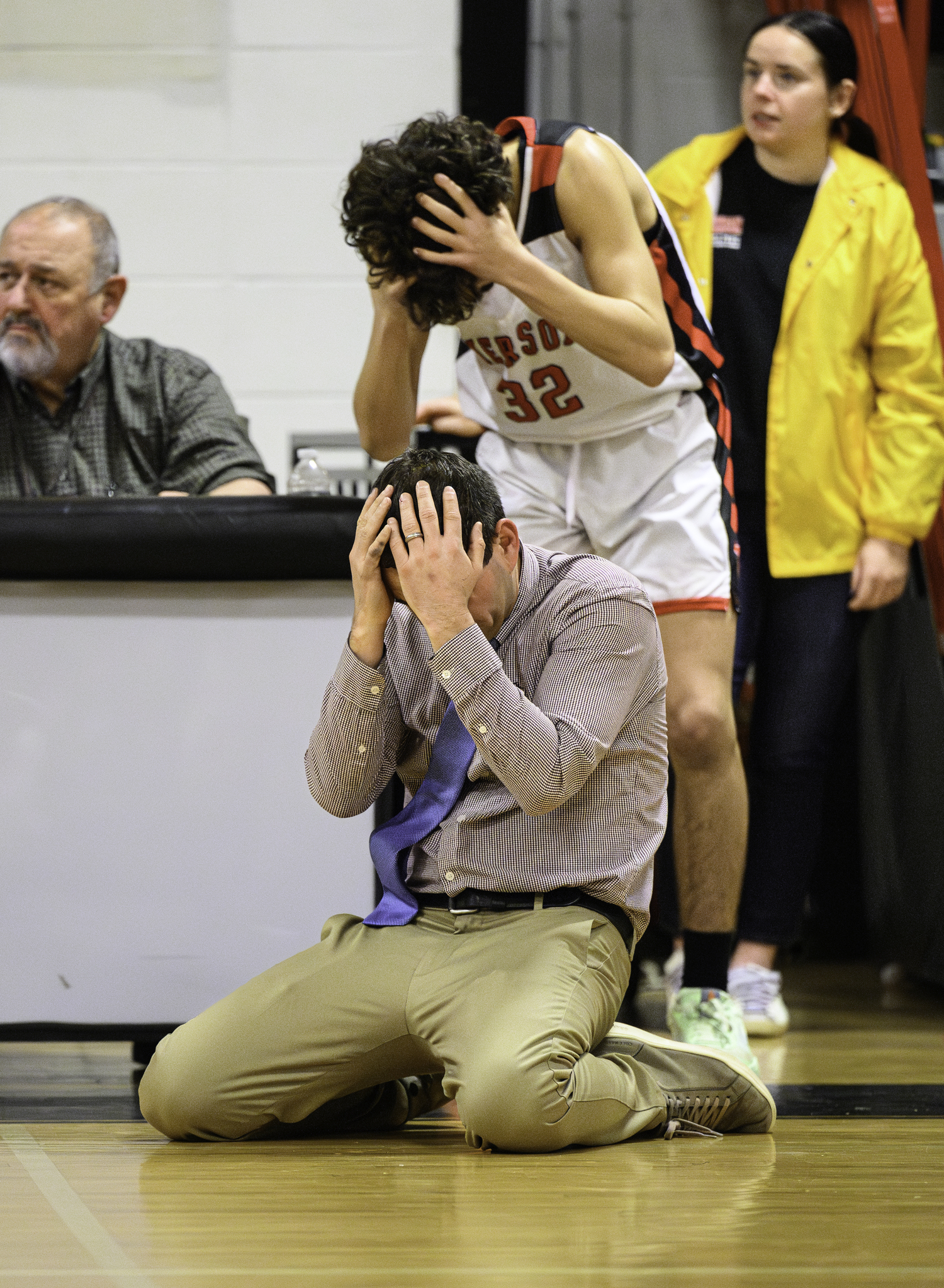 Pierson head coach Dan White and Max Vogel react after at a late foul in Friday night's game.   MARIANNE BARNETT