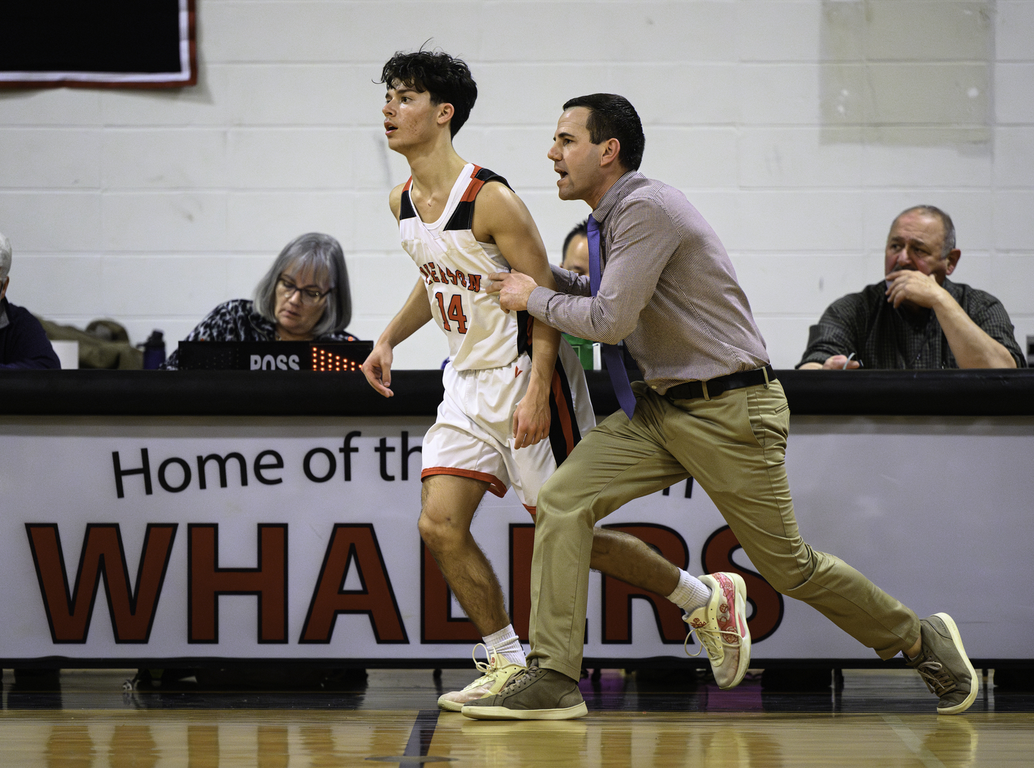 Dan White sends in Casey Finneli late in the game.  MARIANNE BARNETT