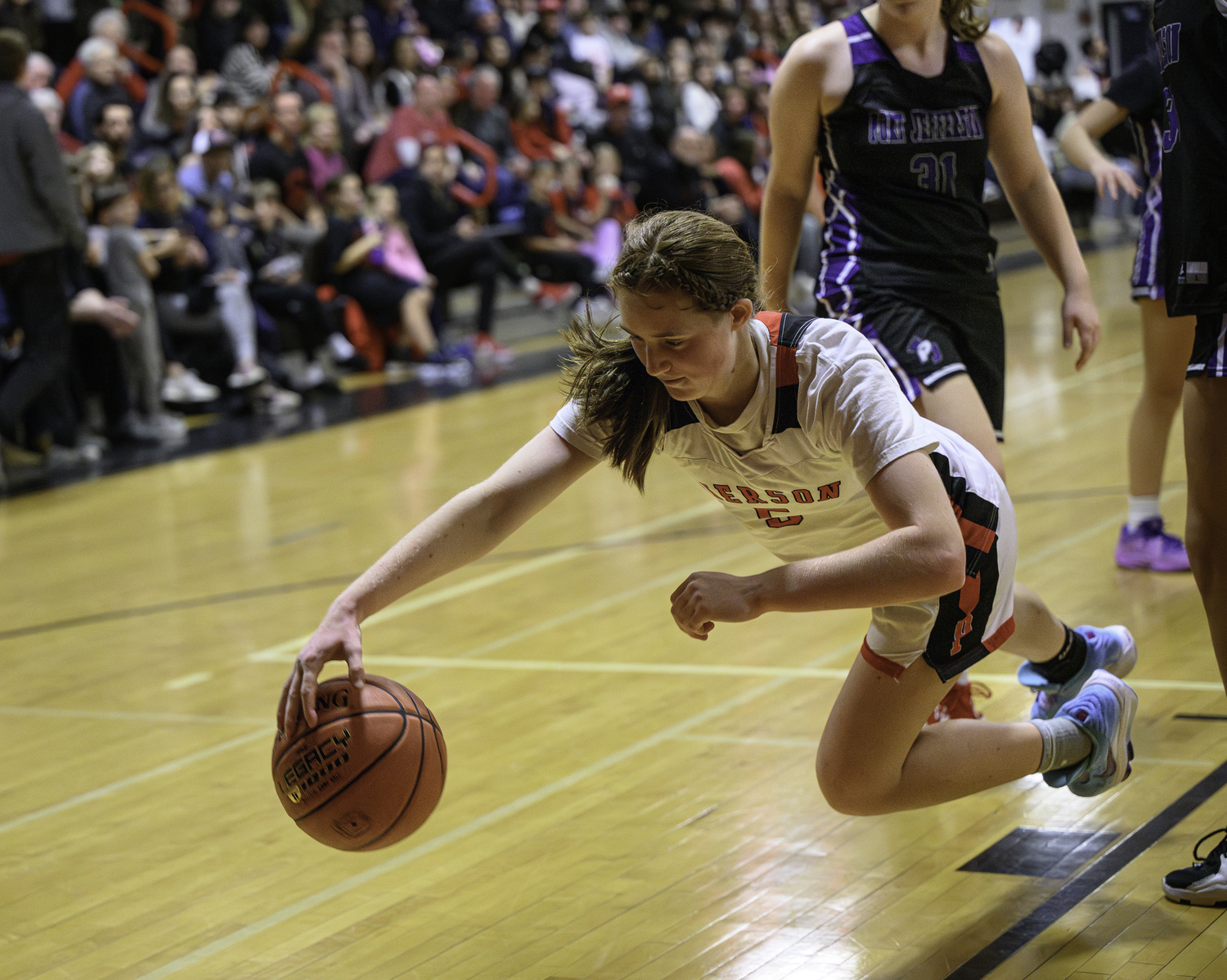 Josie Mott tries to keep the ball in play.  MARIANNE BARNETT