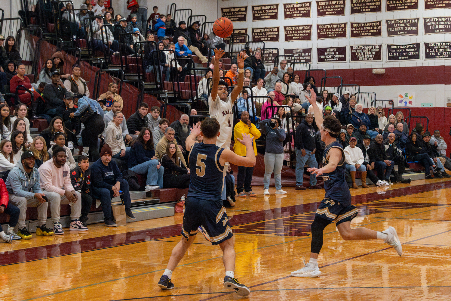 Southampton senior Tyson Reddick shoots a three-pointer. He finished with a program record 11 made three and a career-high 37 points.   RON ESPOSITO/SOUTHAMPTON SCHOOL DISTRICT