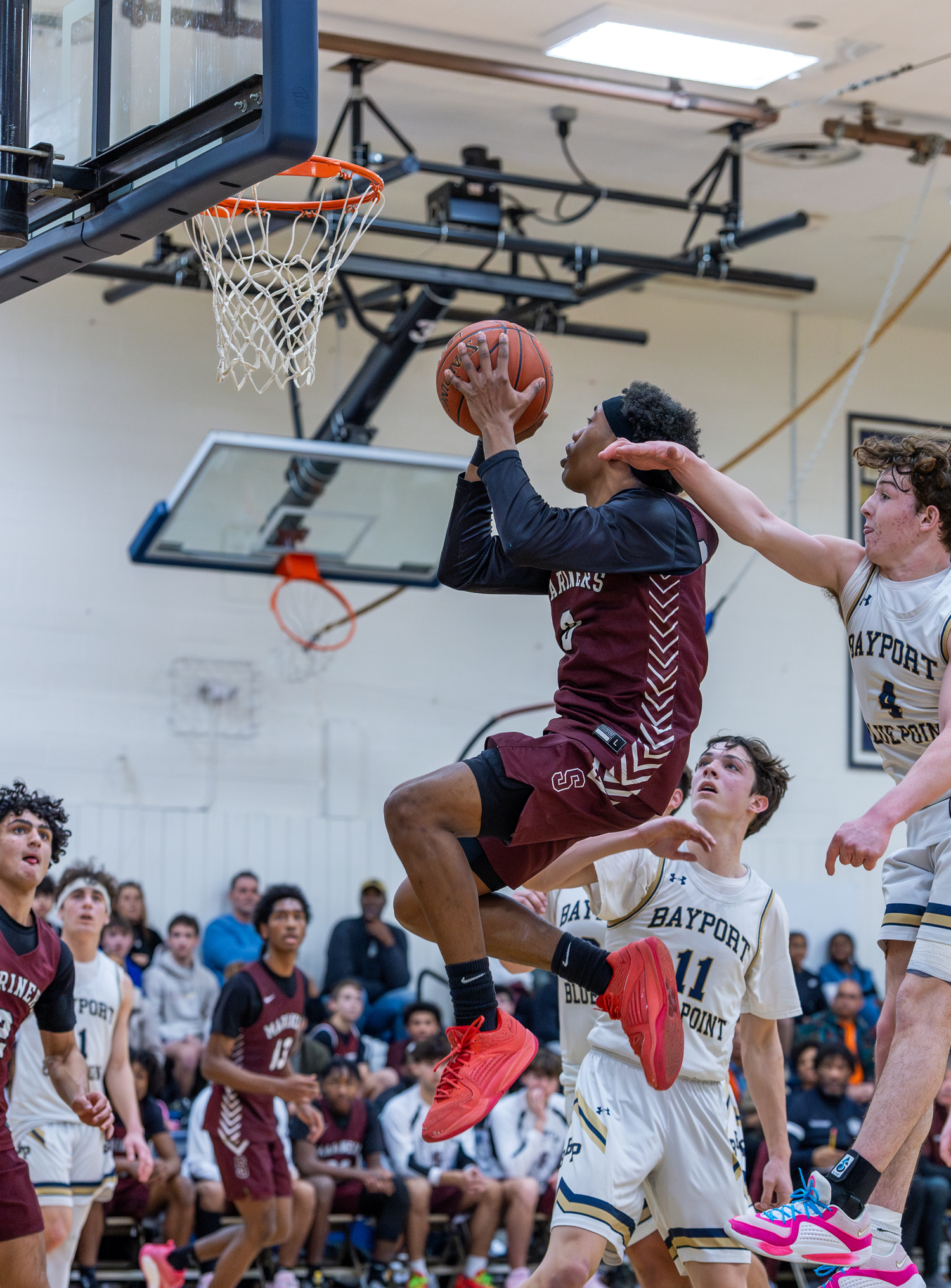 Senior Mariner Naevon Williams scored 15 points to go along with six rebounds, five assists and three blocks in last week's at Bayport-Blue Point.   RON ESPOSITO