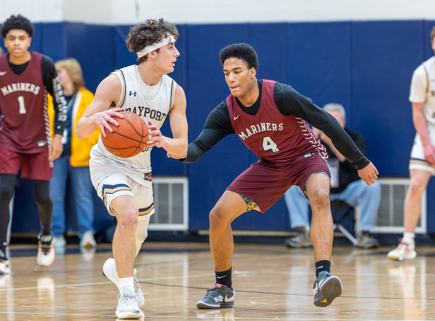 Southampton junior Davon Palmore covers Bayport-Blue Point senior Dylan Craig.   RON ESPOSITO