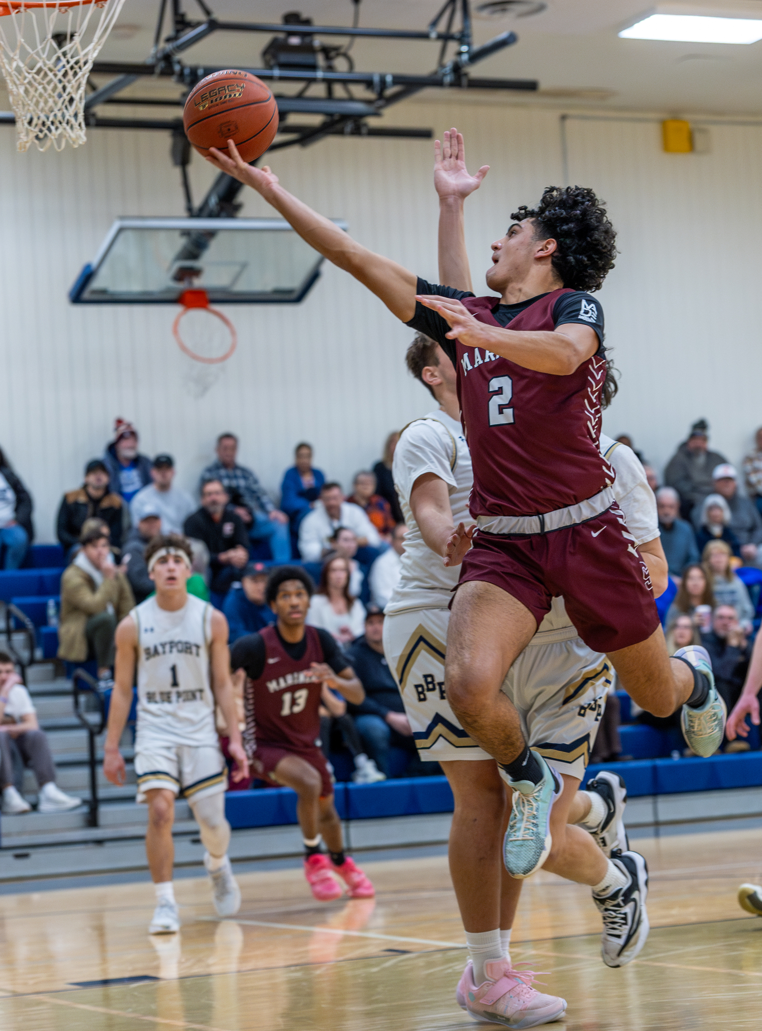 Southampton junior Alex Franklin goes up with a right-handed layup.   RON ESPOSITO