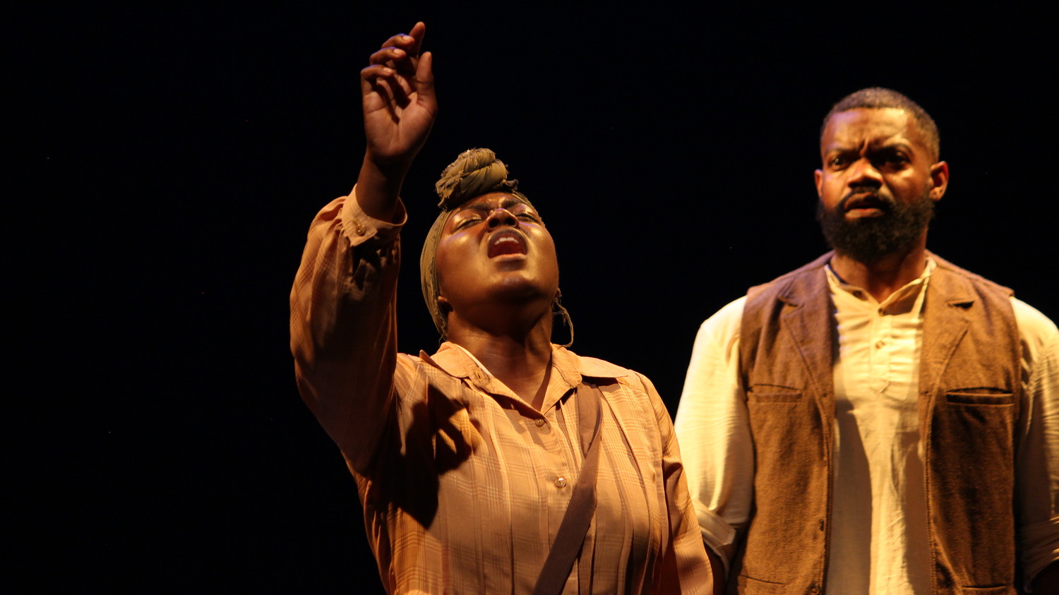 Destiny DeShawn (ensemble member) and Travis Pratt (as Bali) during a performance of 