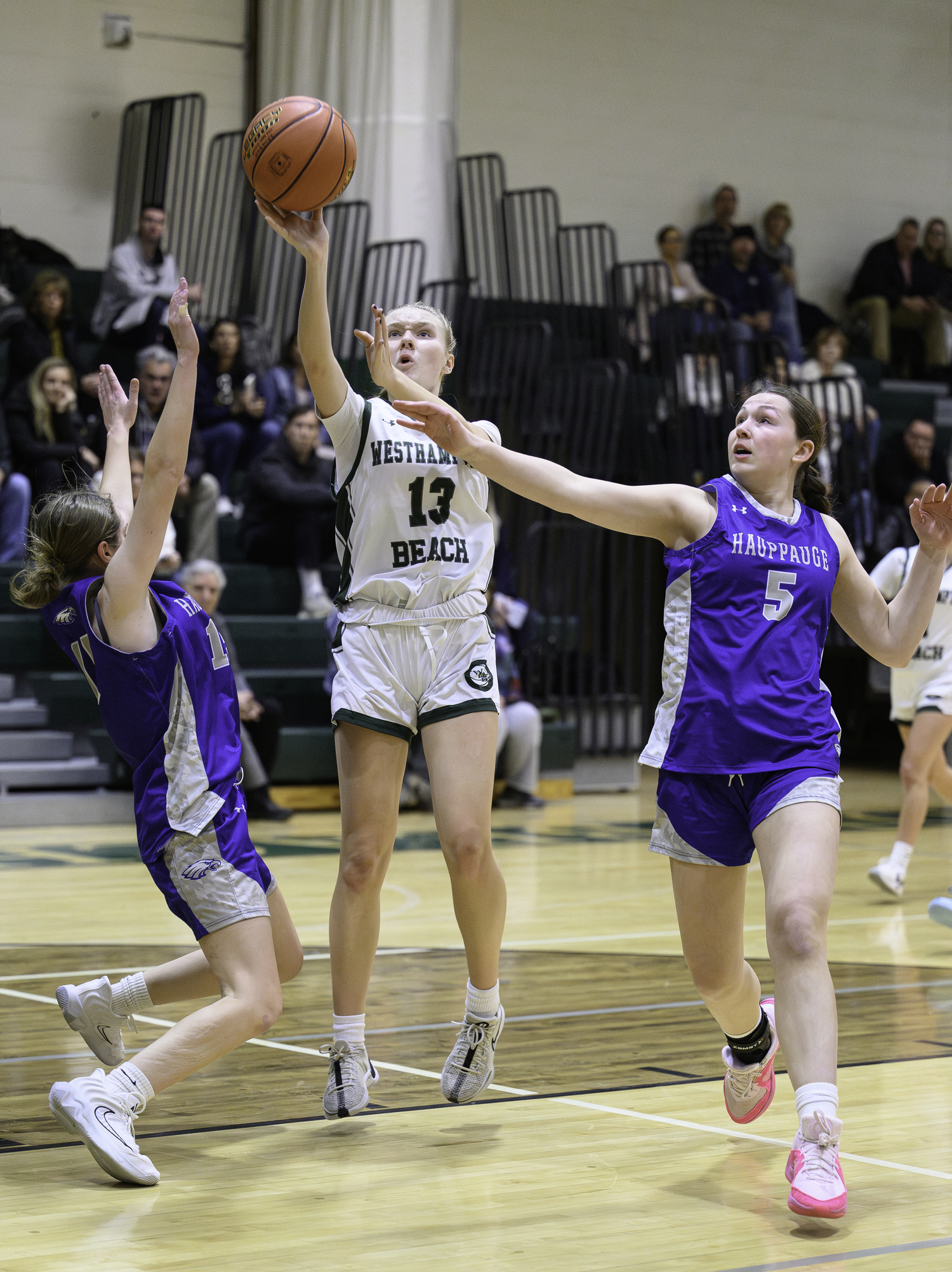 Sophomore guard Kate Sweet shoots. MARIANNE BARNETT