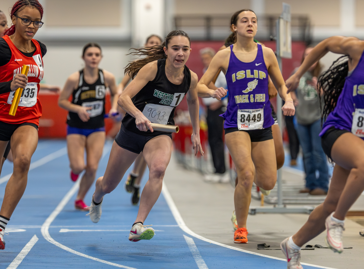 Westhampton Beach senior Halle Geller takes off in the 4x200-meter relay.   RON ESPOSITO