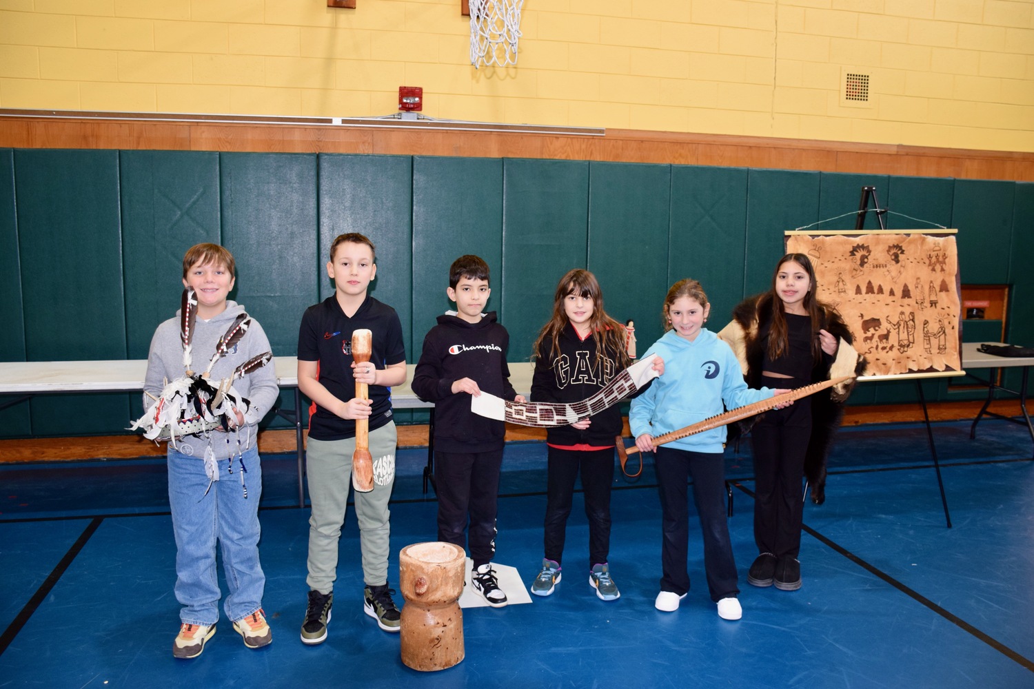 Westhampton Beach Elementary School fourth graders learned about the life and history of Native Americans during a Journeys into American Indian Territory program on January 22. During the event, students explored Native American artifacts such as clothing, dolls and pottery and listened to traditional stories. COURTESY WESTHAMPTON BEACH SCHOOL DISTRICT