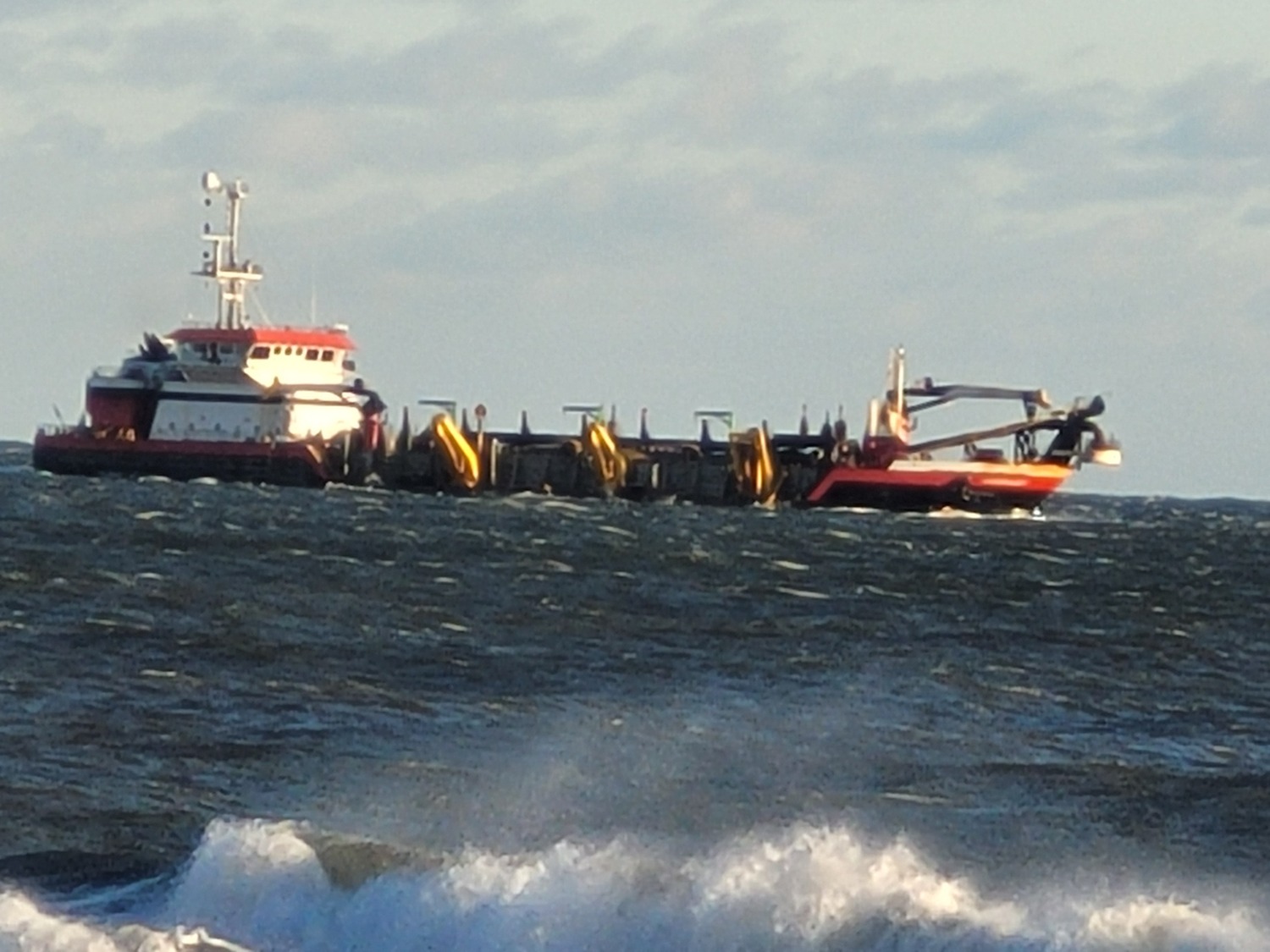 The 350-foot dredging vessel Magdalena is sucking up sand from the ocean floor off Quogue and transport it about 2 miles west to a connection pipe and pump it ashore at Cupsogue Beach. ARAM TERCHUNIAN