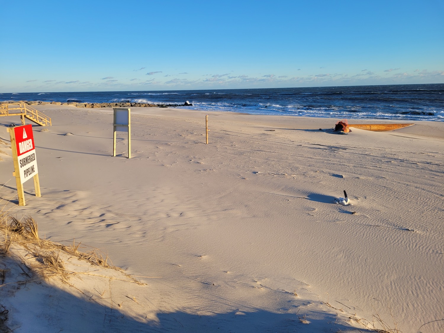 Dredging crews will rebuild the bay side shoreline of Cupsogue Beach over the next month then shift to working on nourishing ocean beaches in Westhampton and West Hampton Dunes in February. ARAM TERCHUNIAN