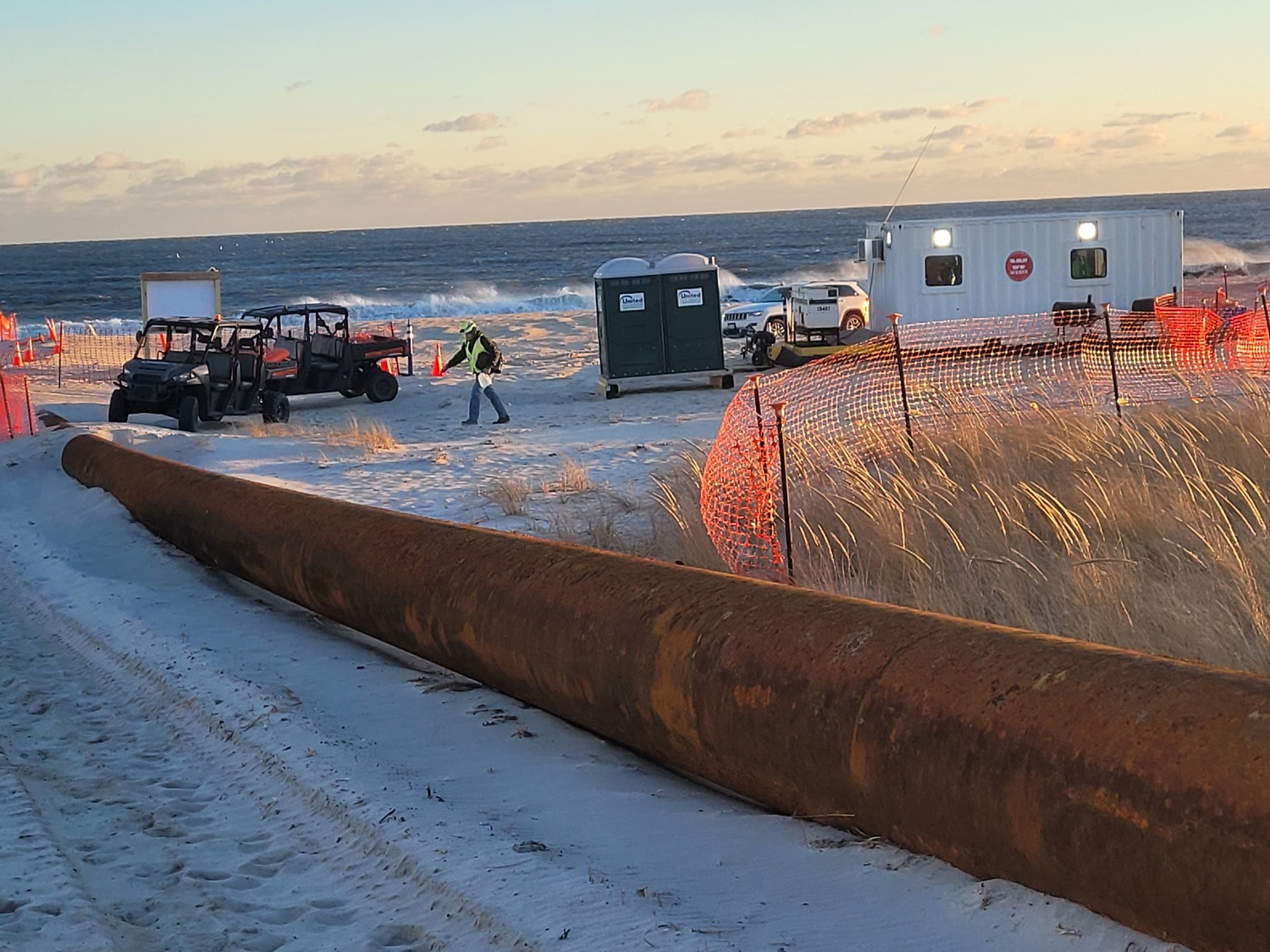 Dredging crews will rebuild the bay side shoreline of Cupsogue Beach over the next month then shift to working on nourishing ocean beaches in Westhampton and West Hampton Dunes in February. ARAM TERCHUNIAN