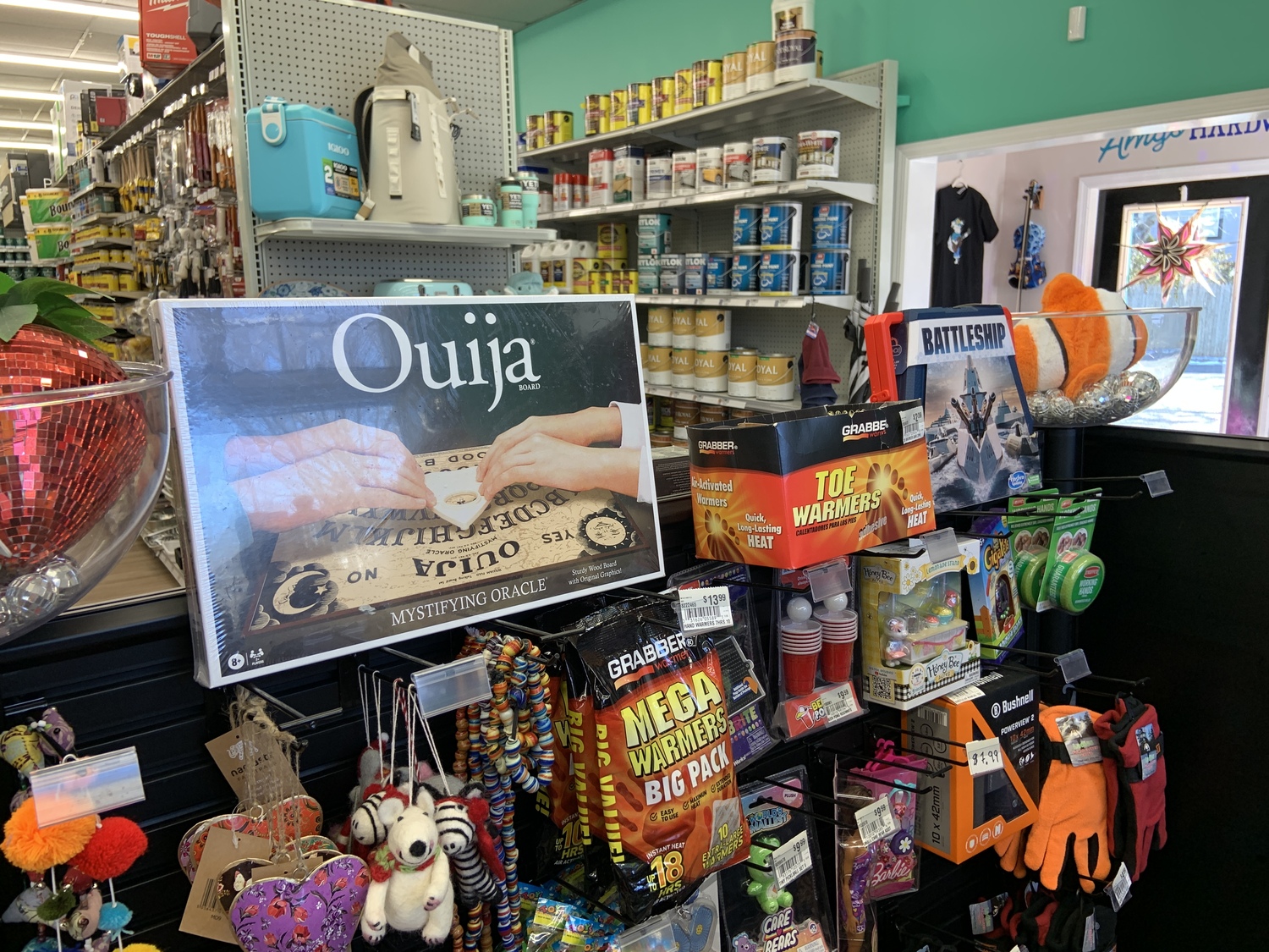 Ouija Boards and games like Battleship are among the novel stock being carried by Amy's Hardware. STEPHEN J. KOTZ